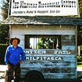 Milpitas Historical Society President Roger Skuse with the old Frontier Days jail